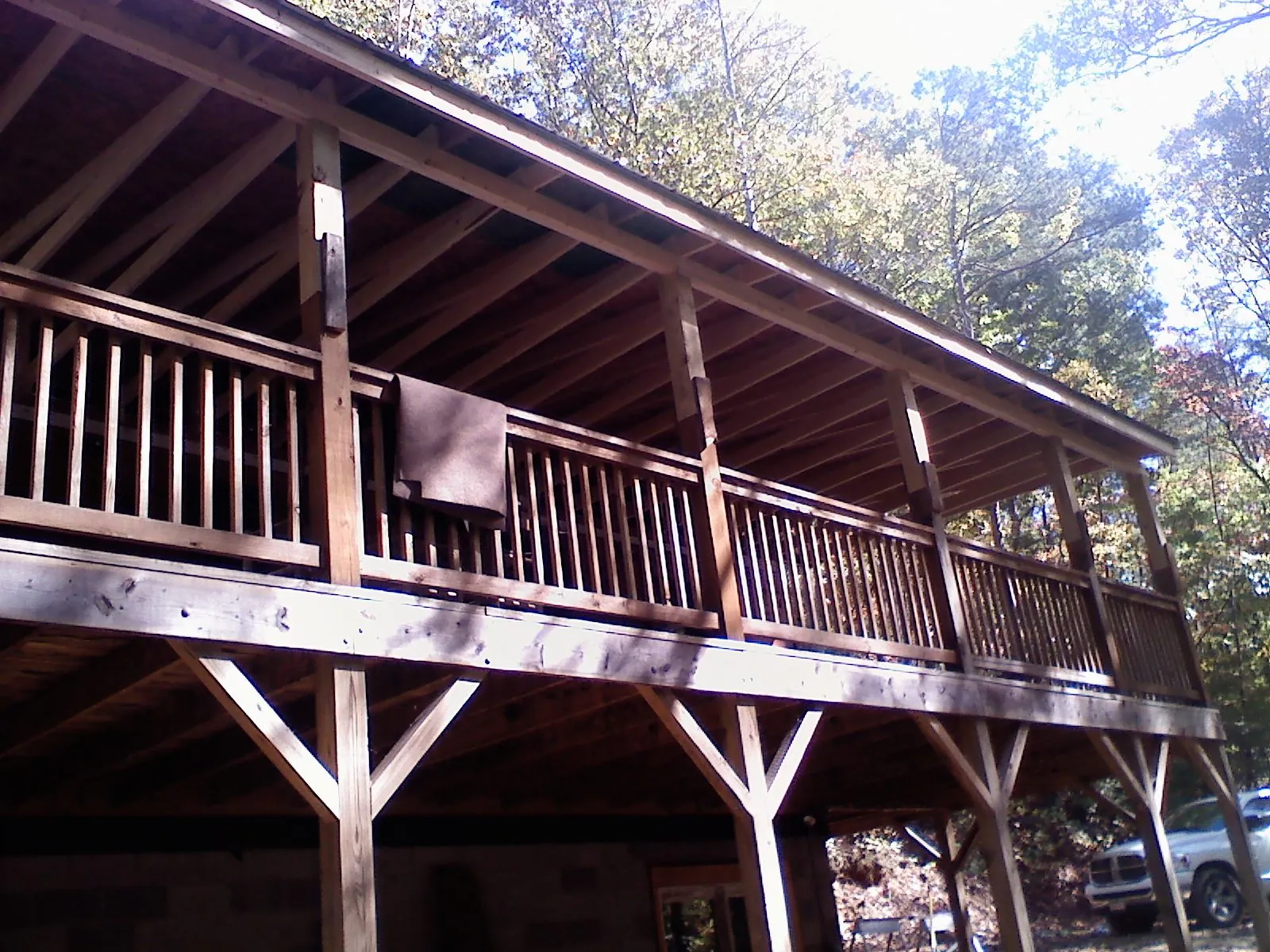 Timber framing under a new elevated porch and deck — Roof Leak Repair in Pylesville by Roofing Brothers